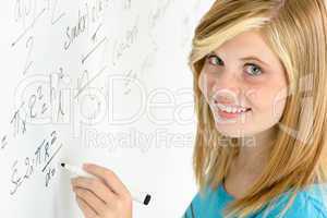 student teenage girl write mathematics white board