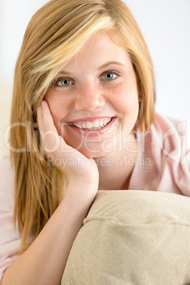 smiling teenage girl looking at camera