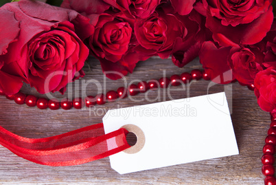 white label with red roses