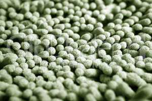 green carpet fabric items