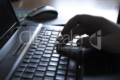 human fingers on the keyboard