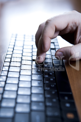 human fingers on the keyboard