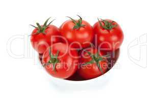 white bowl of red tomatoes on a white background