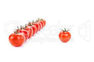red tomatoes lined up in a row on a white background