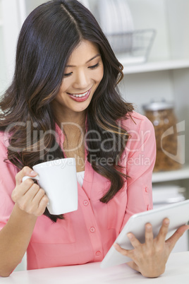 chinese asian woman tablet computer & coffee