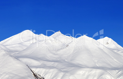 snowy mountains and blue sky at nice day