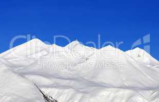 snowy mountains and blue sky at nice day