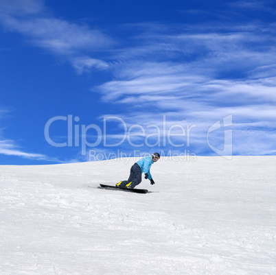 snowboarder in winter mountains