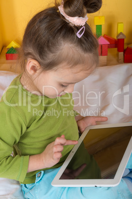 small girls with tablet