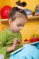 small girls with tablet