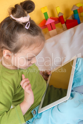 small girls with tablet