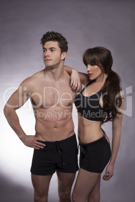 young couple exercise together