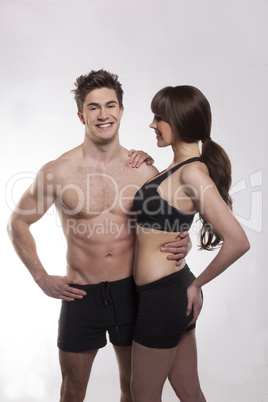 young couple exercise together