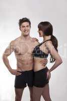 young couple exercise together