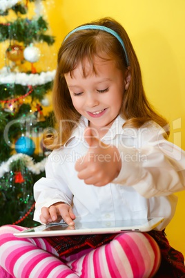 small girls with tablet