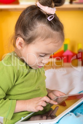 small girls with tablet