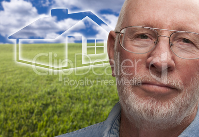 Melancholy Senior Man with Grass Field and Ghosted House Behind