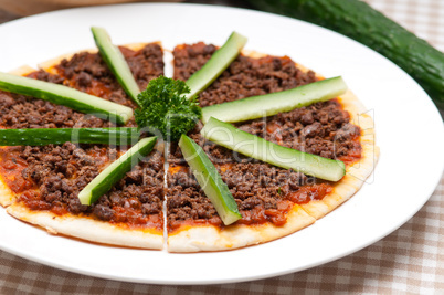 turkish beef pizza with cucumber on top