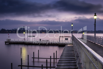 pier of historic ferry boats before sunrise