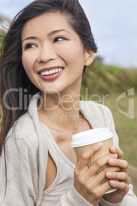 asian chinese woman girl drinking coffee outside