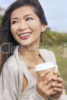 asian chinese woman girl drinking coffee outside