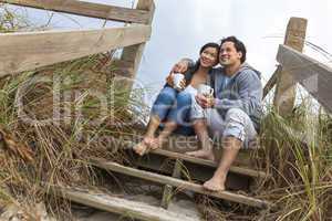 asian man woman romantic couple on beach steps