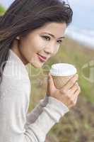 asian chinese woman girl drinking coffee outside