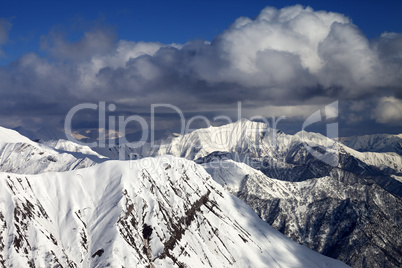 snowy ridges with trace from avalanche