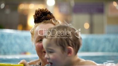 Grandmother and a grandson in the swimming pool