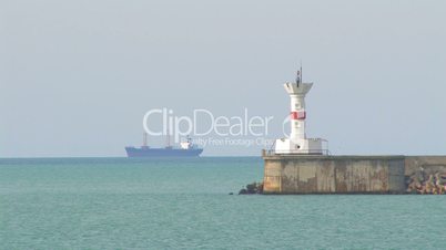 Lighthouse and ship.