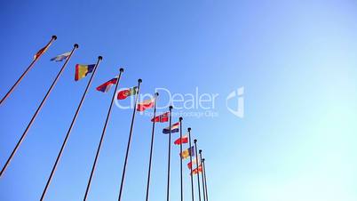 international flags on a background of blue sky.