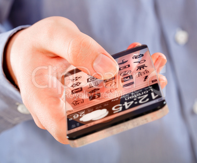 smartphone with transparent screen in human hands.