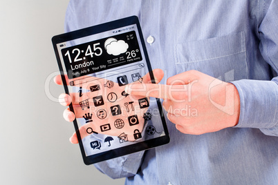tablet with transparent screen in human hands.