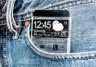 smartphone with a transparent screen in a pocket of jeans.