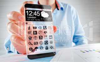 smartphone with transparent screen in human hands.