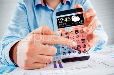 smartphone with transparent screen in human hands.