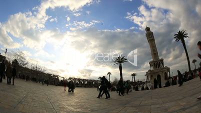 time lapse clock tower, beautiful clouds and crowded pedestrian at city square