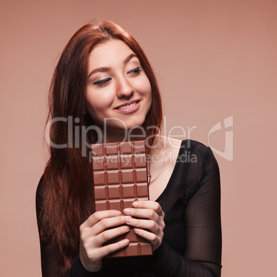 portrait  young girl with the big chocolate