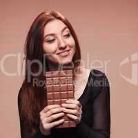 portrait  young girl with the big chocolate