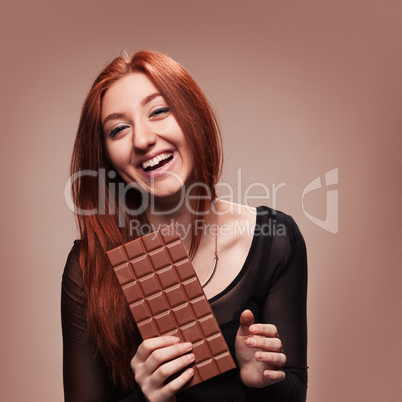 portrait happy young girl with the big chocolate