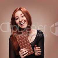 portrait happy young girl with the big chocolate