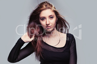 portrait of beautiful girl with fluttering hair.