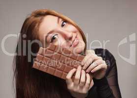 portrait of sweet girl with the big chocolate