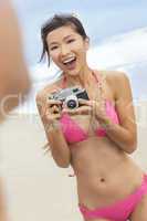 asian chinese woman girl camera at beach in bikini