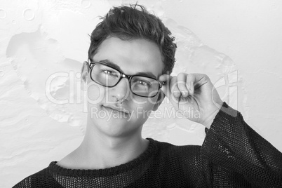 young casual man with glasses