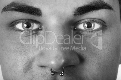 form-fitting portrait of a pierced man