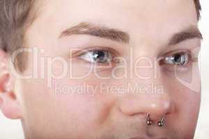 form-fitting portrait of a pierced man