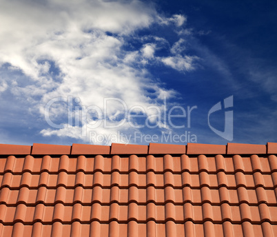 roof tiles and sky with clouds