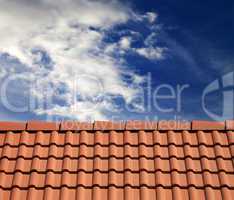 roof tiles and sky with clouds