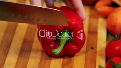 close up of chopping a red bell pepper